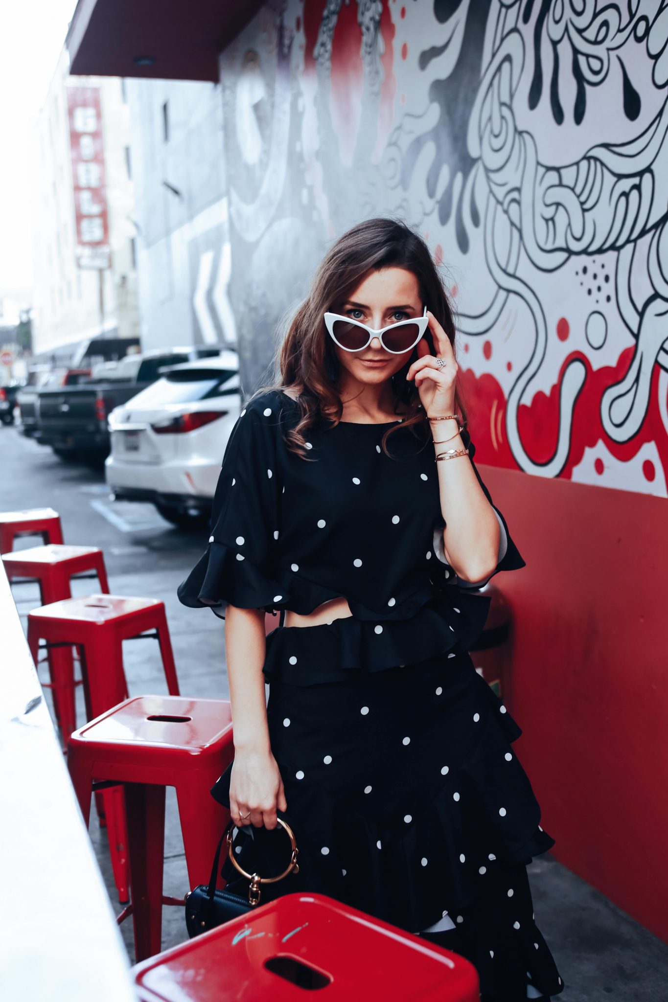 Evening dresses with Fame and Partners, A LA brand specialized in wedding party dresses. Julia Comil, French Fashion blogger in Los Angeles features the black and white polka dots Marisa dress from Fame and Partners - shot in Downtown Los Angeles