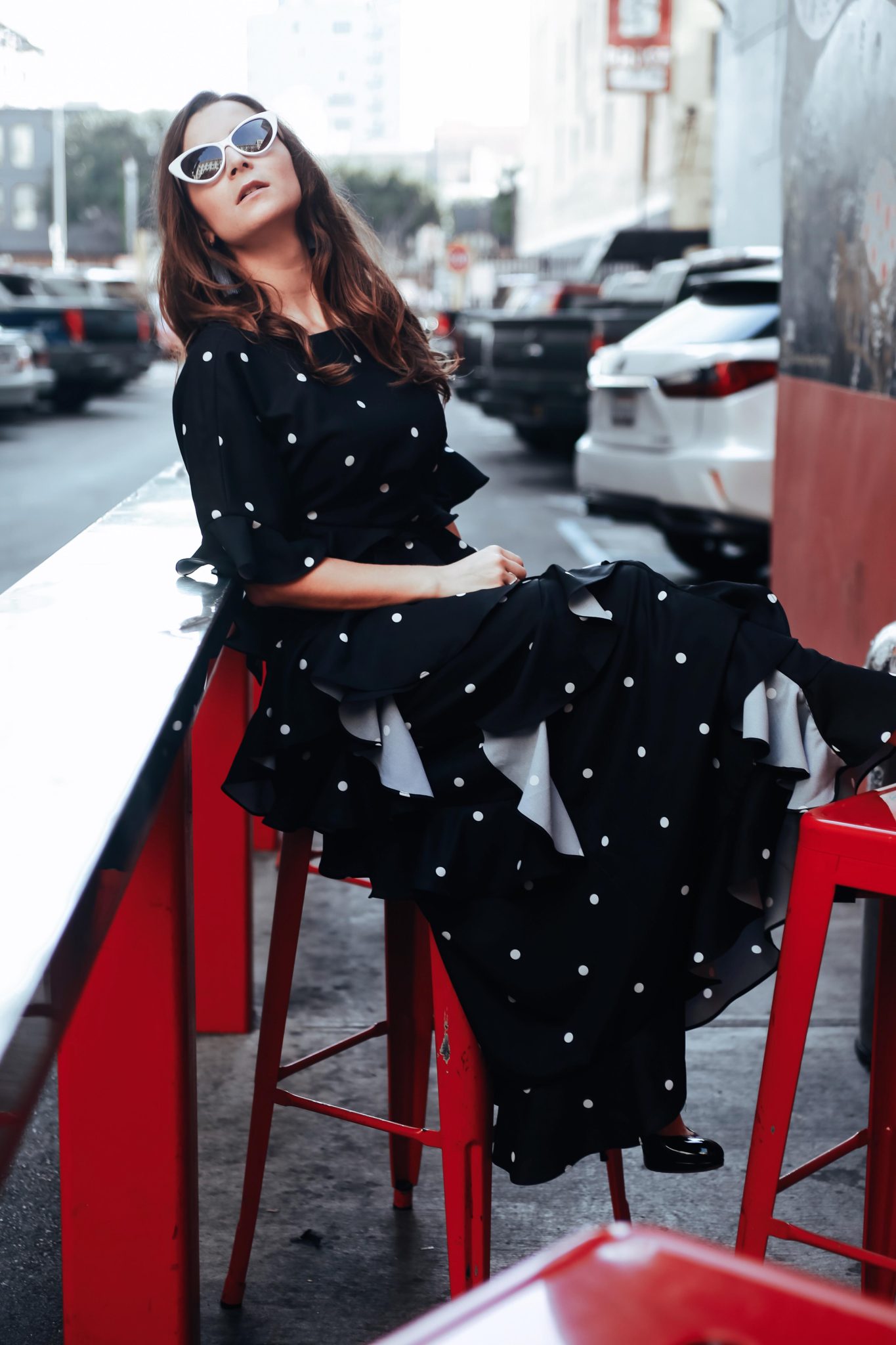 Evening dresses with Fame and Partners, A LA brand specialized in wedding party dresses. Julia Comil, French Fashion blogger in Los Angeles features the black and white polka dots Marisa dress from Fame and Partners - shot in Downtown Los Angeles