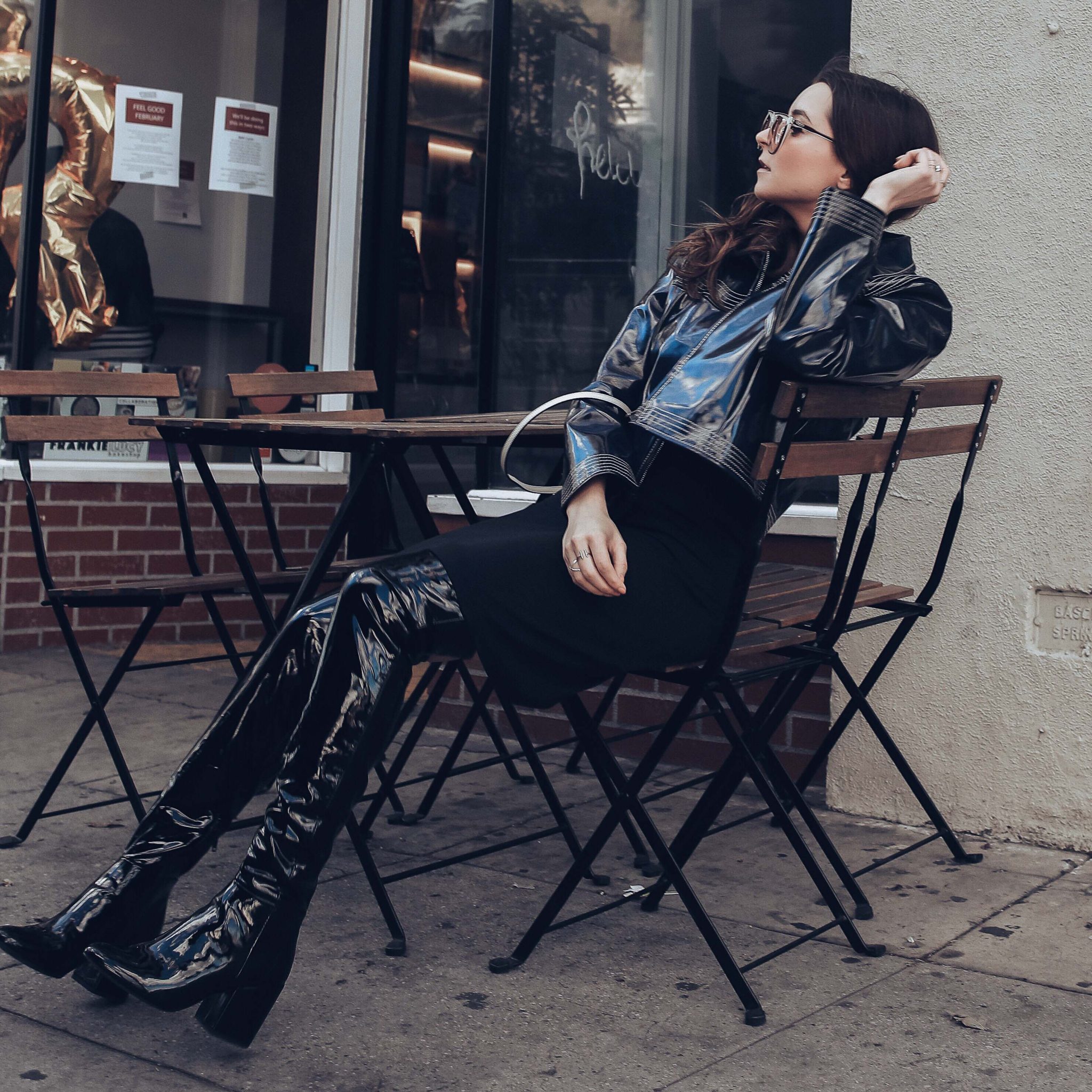 How to style Patent leather jacket and Patent leather boots - How to style the Vinyl trend. More on Houseofcomil.com - Blue Leather jacket by Ganni on If Chic, Nano MC Chevron Bag by Strathberry, Patent Leather Boots OTK by Aldo. Styled by Julia Comil French Fashion Blogger in Los Angeles 