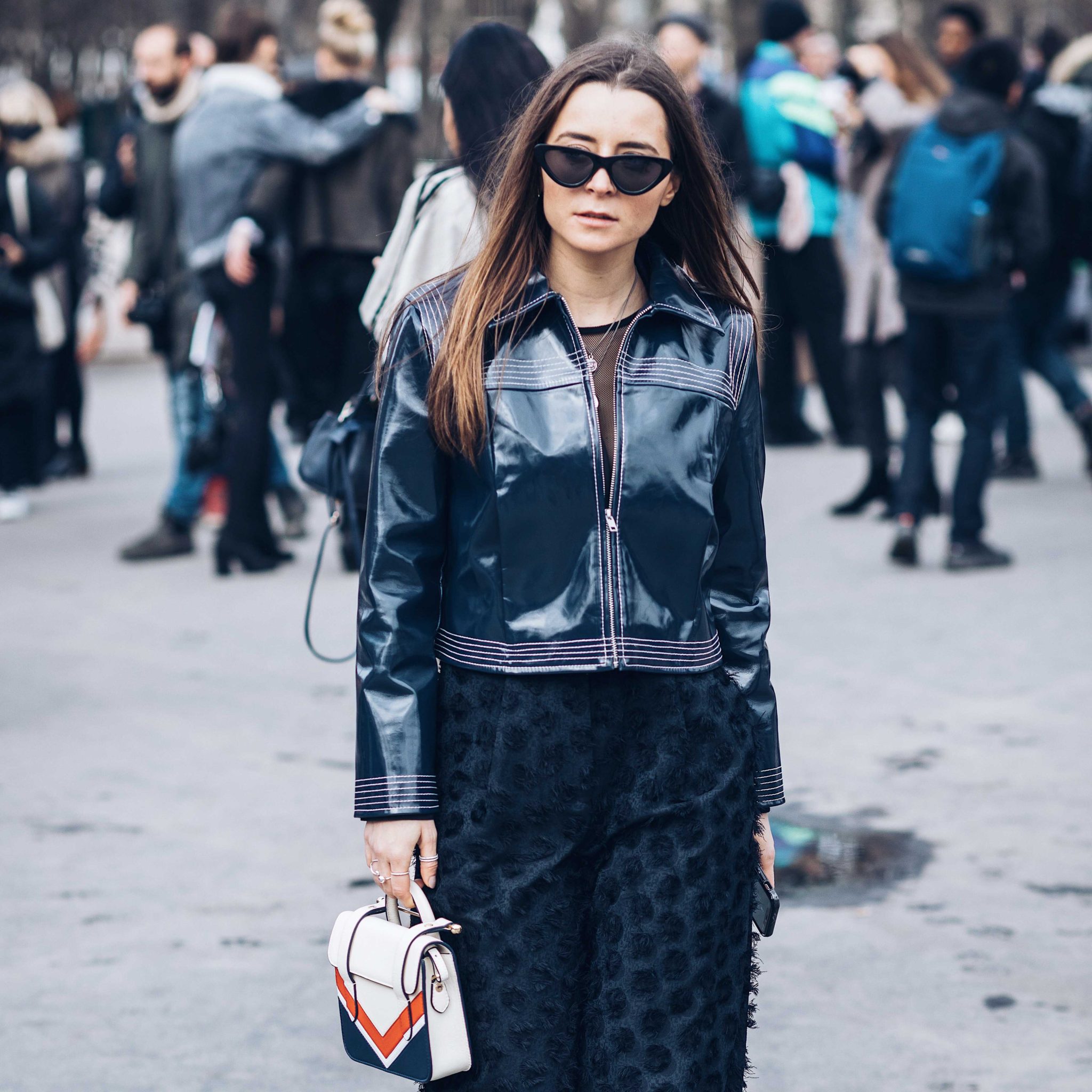 Best Street Style Paris Fashion Week Mars 2018 of Julia Comil / French Fashion Blogger in Los Angeles - Outfit for Chanel Fall Winter 2018 2019 show - Ganni Motor Jacket - Strathberry bag