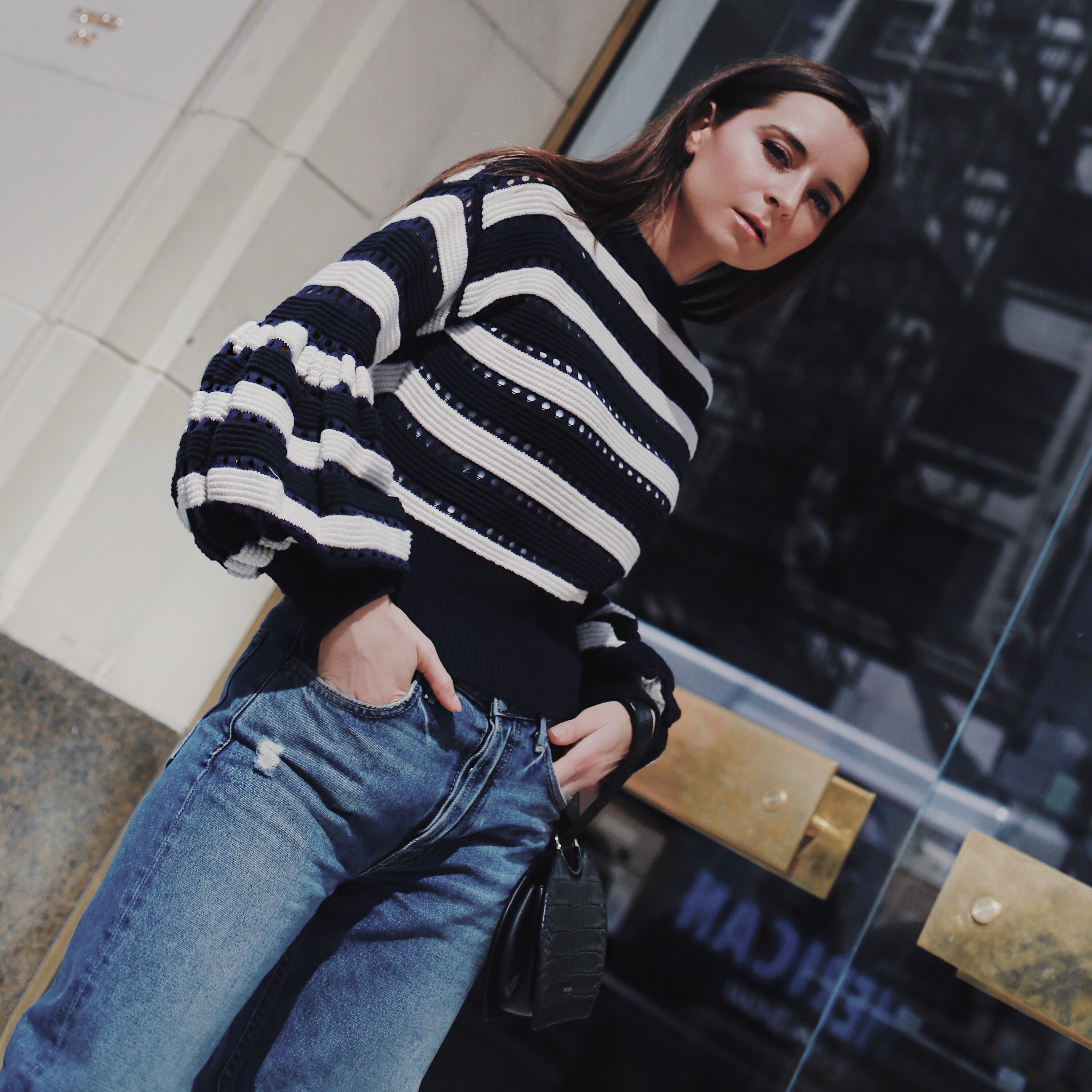 Best designer sweaters. Make an impact with a designer sweater. Find your designer sweater to be cozy and stylish this Winter. Wearing a Self Portrait sweater: balloon sleeve striped cropped sweater worn by fashion blogger Julia Comil