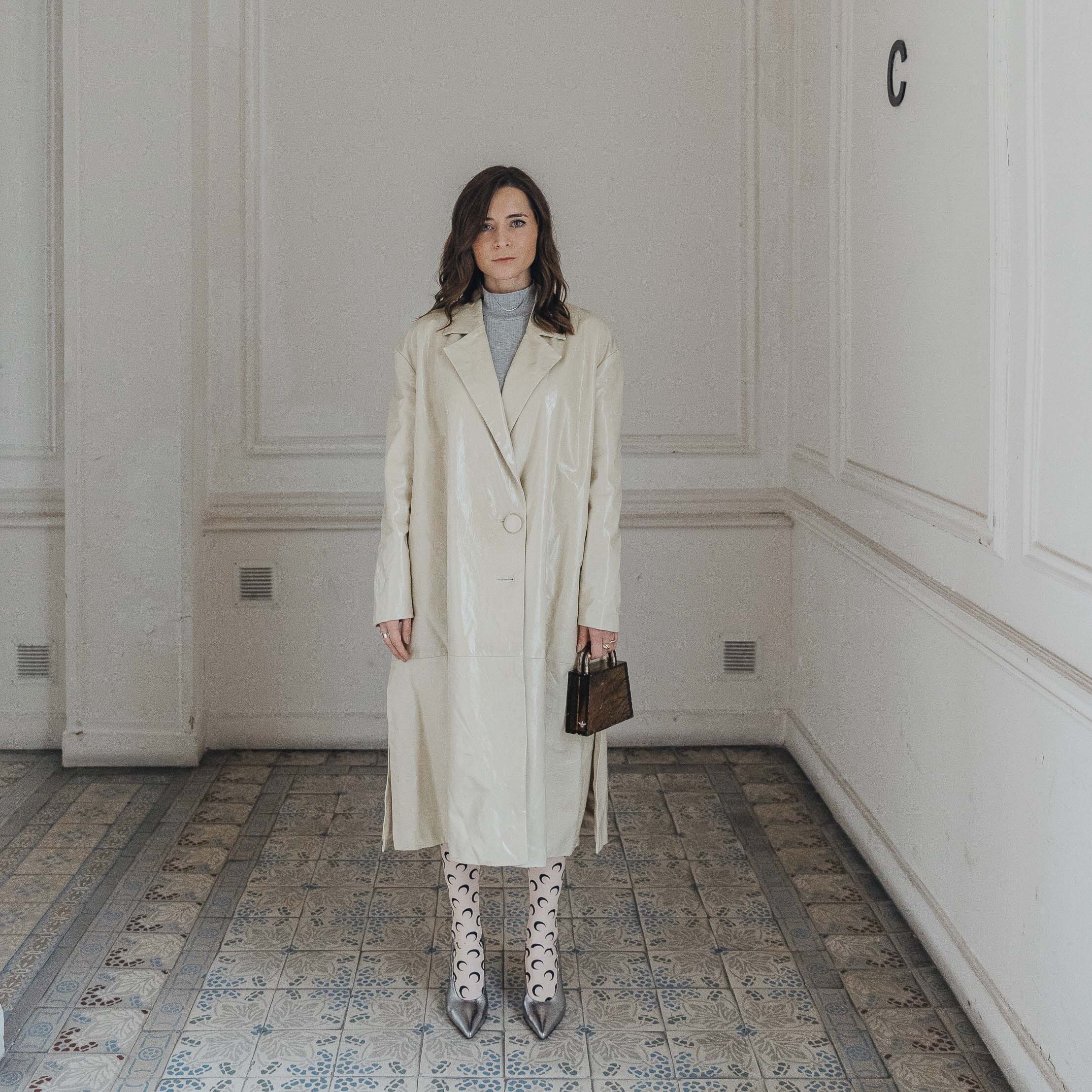 PFW SS20 Street Style Fall 2019 Paris Fashion Week Julia Comil wearing Madiyahalsharqi coat, bag Lilianafshar, pumps Clergerie, Tights Marine Serre