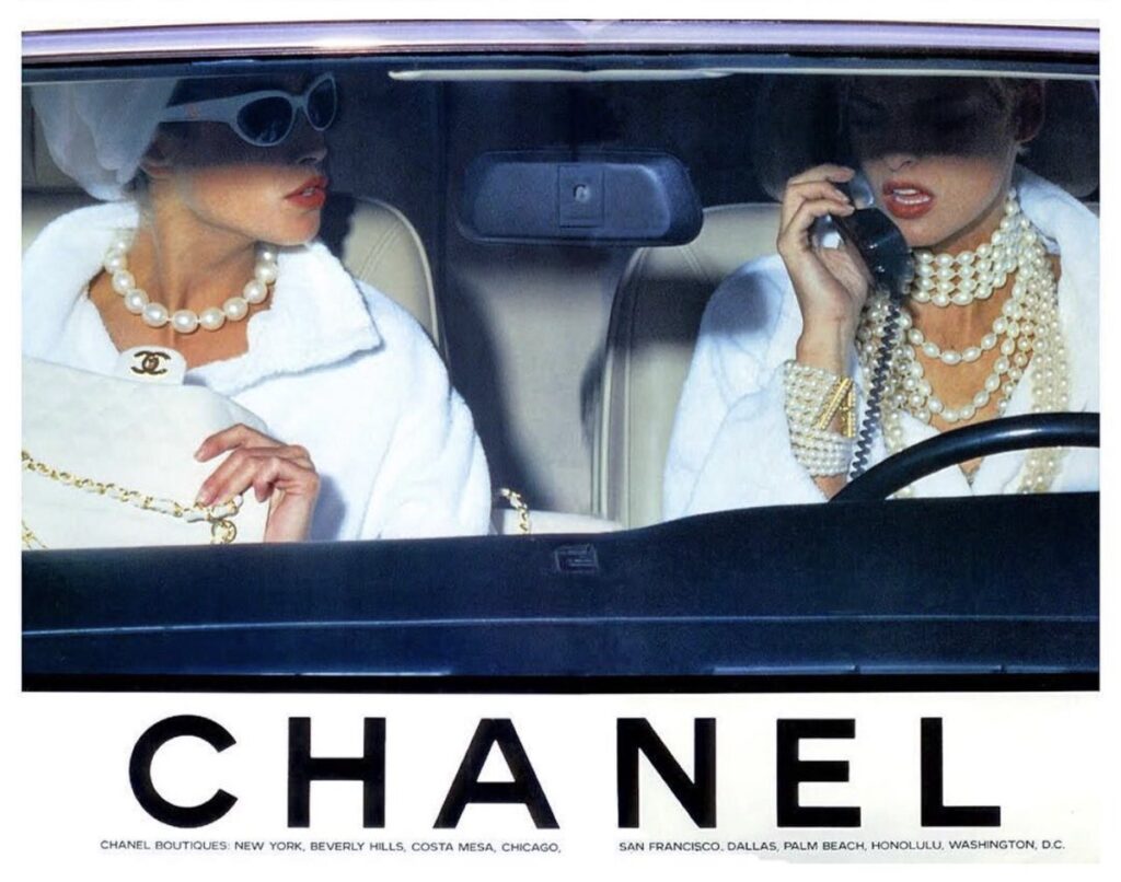 Linda Evangelista & Christy Turlington Chanel fashion Ads 1990s shot by Karl Lagerfeld - car shot with phone and pearl