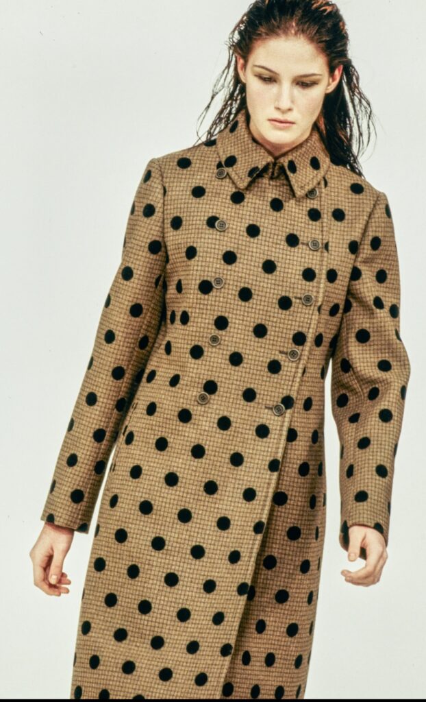 Miu Miu 90s runway looks are so relevant in 2024. Discover more looks on Modersvp.com by Julia Comil. Polka dots coat