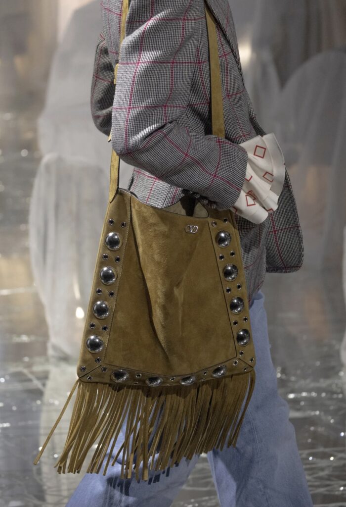 Best Spring Summer 2025 fashion trends on the runway Brown Suede fringes boho chic Valentino bag