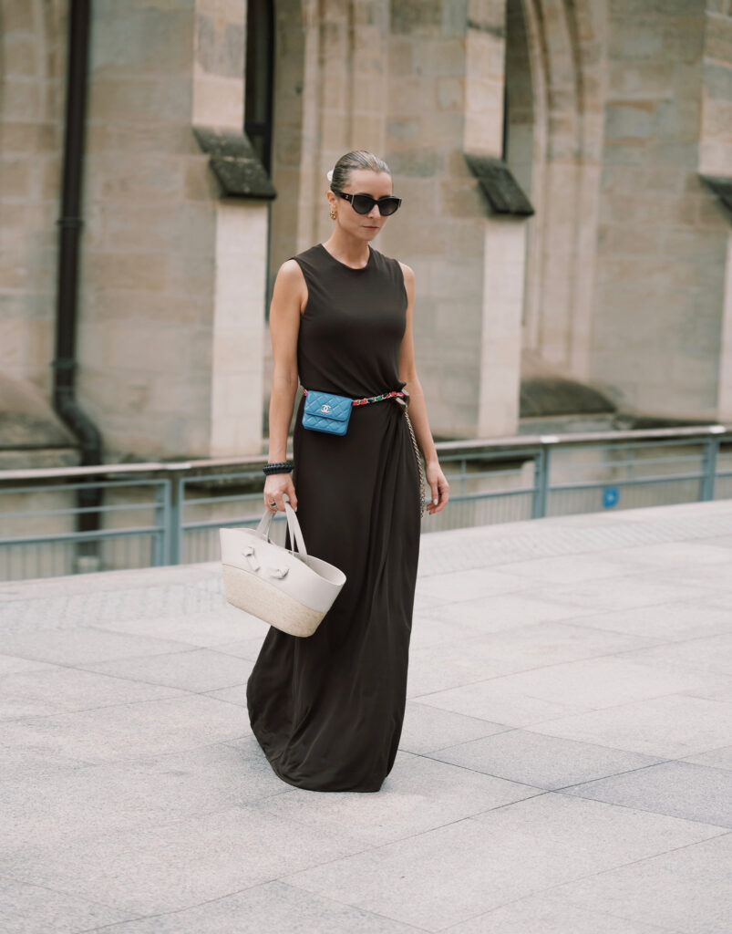 paris couture week brown maxi greek dress and raffia bag altuzarra and chanel blue belt bag at couture week paris julia comil
