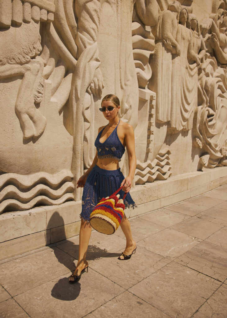 paris couture week blue crochet metallic top and skirtcolored straw bag and brown malone souliers shoes julia comil at couture week paris fashion week